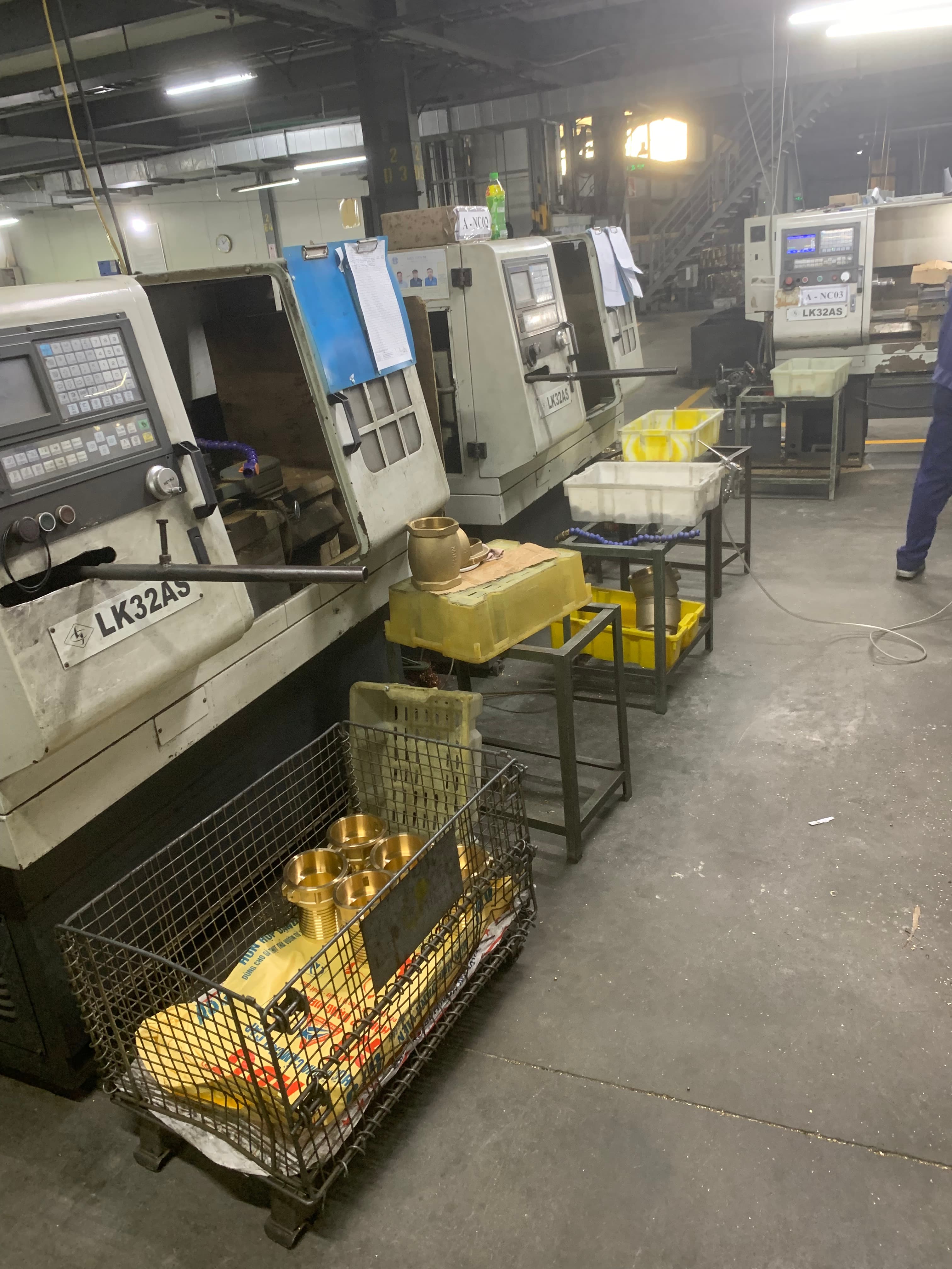 Manufacturing machinery and active factory floor in Vietnam